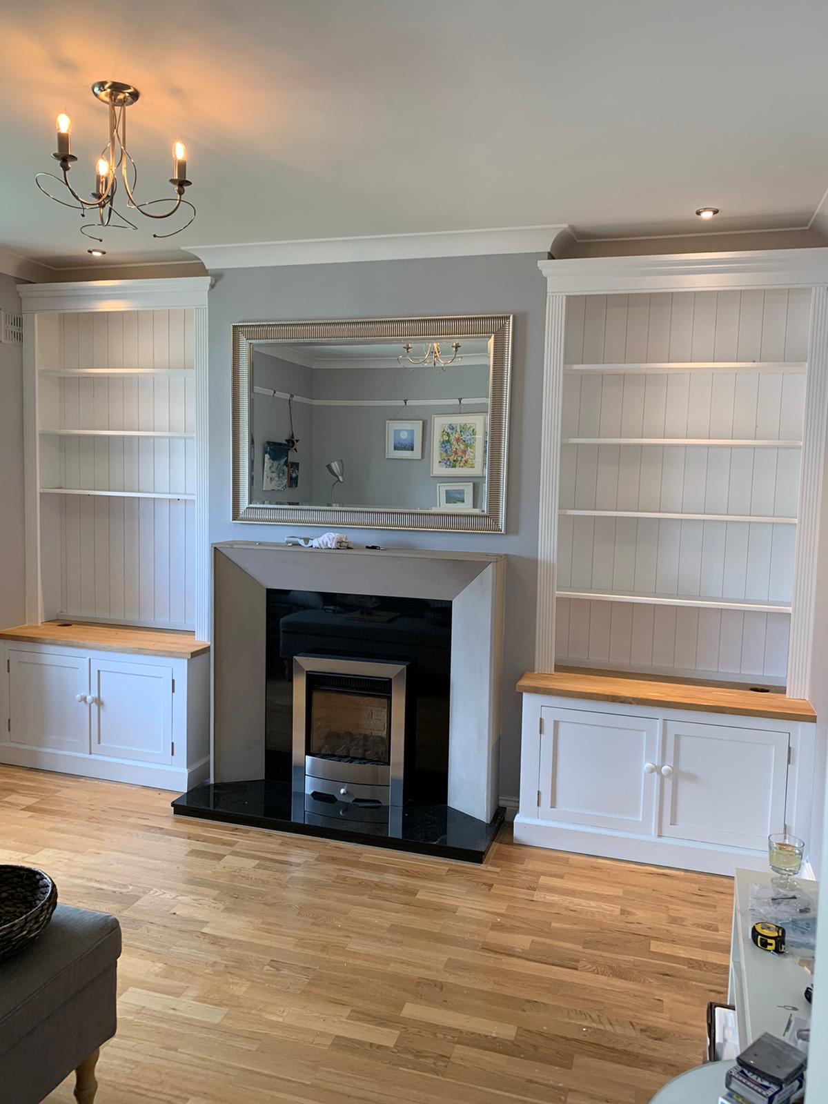 Pair of built in traditional alcoves units.
